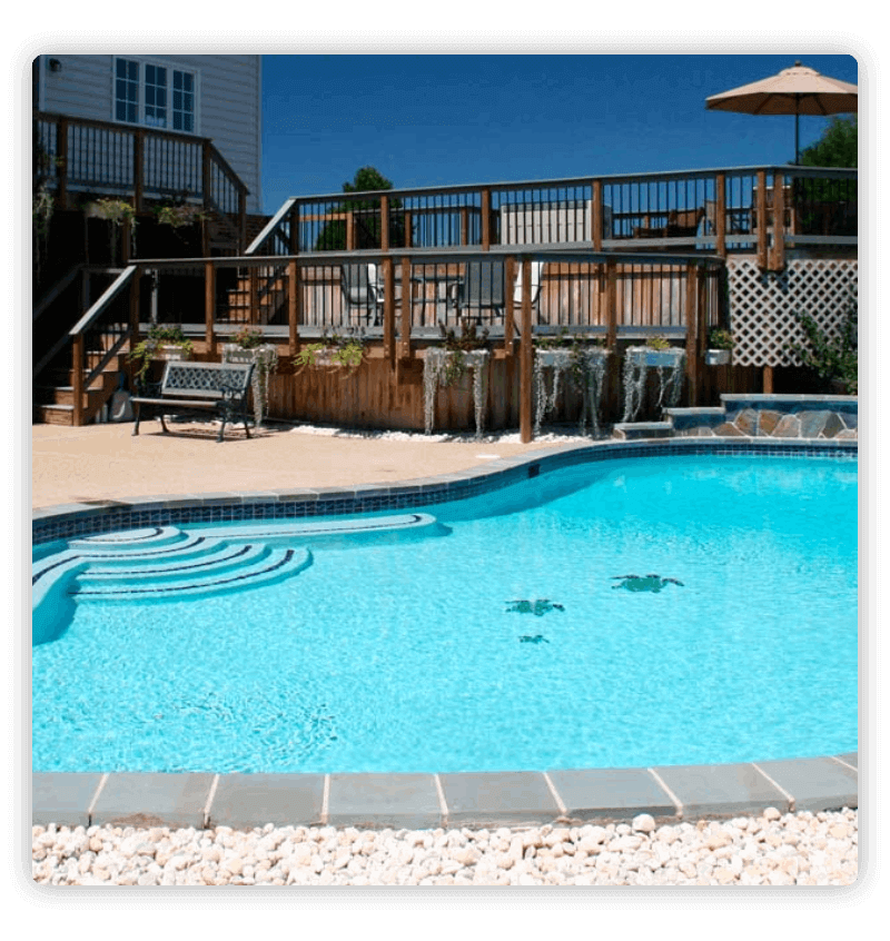 Multi-level deck leading to blue pool