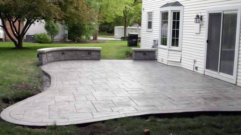 Patchwork of stone shaped into guitar shaped porch